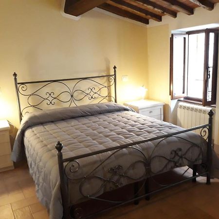 Apartamento La Corte Antica Pienza Habitación foto