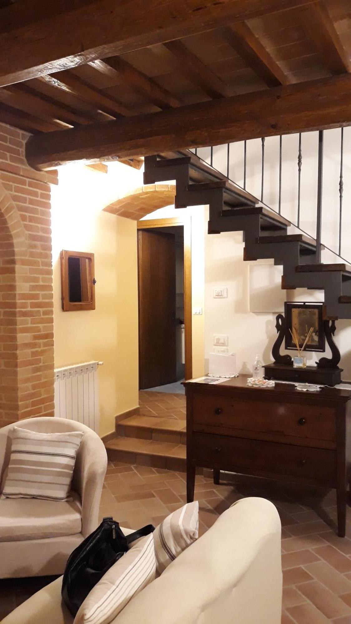 Apartamento La Corte Antica Pienza Habitación foto